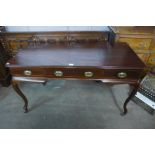 A Victorian mahogany three drawer writing table, 75cms h, 130cms w, 59cms d