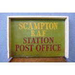 A painted wooden Scampton R.A.F., Station Post Office sign, 54 x 78cms