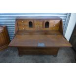 A 19th Century continental inlaid oak bureau, 108cms h, 115cms w, 55cms d