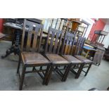 A set of four Arts and Crafts oak dining chairs