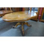 A Victorian figured walnut tilt top breakfast table