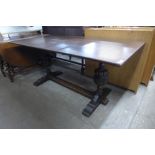 A carved oak refectory table, 75cms h, 168cms l, 85cms w