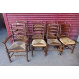 A Harlequin set of eight 18th Century style oak rush seated ladderback chairs