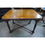 A Victorian oak extending table, 72cms h, 101cms w, 76cms d