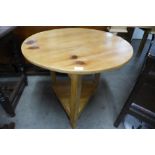 A fruitwood and pine cricket table, 70cms h x 76cms d