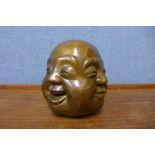 An oriental bronze four faced Buddha, 12cms h