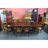 A Harlequin set of ten mahogany balloon back dining chairs and a mahogany pedestal dining table