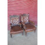 A pair of Victorian carved mahogany and leather upholstered lady's and gentleman's armchairs