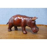 A small brown leather hippopotamus, 9cms h