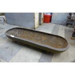 A cast iron trough