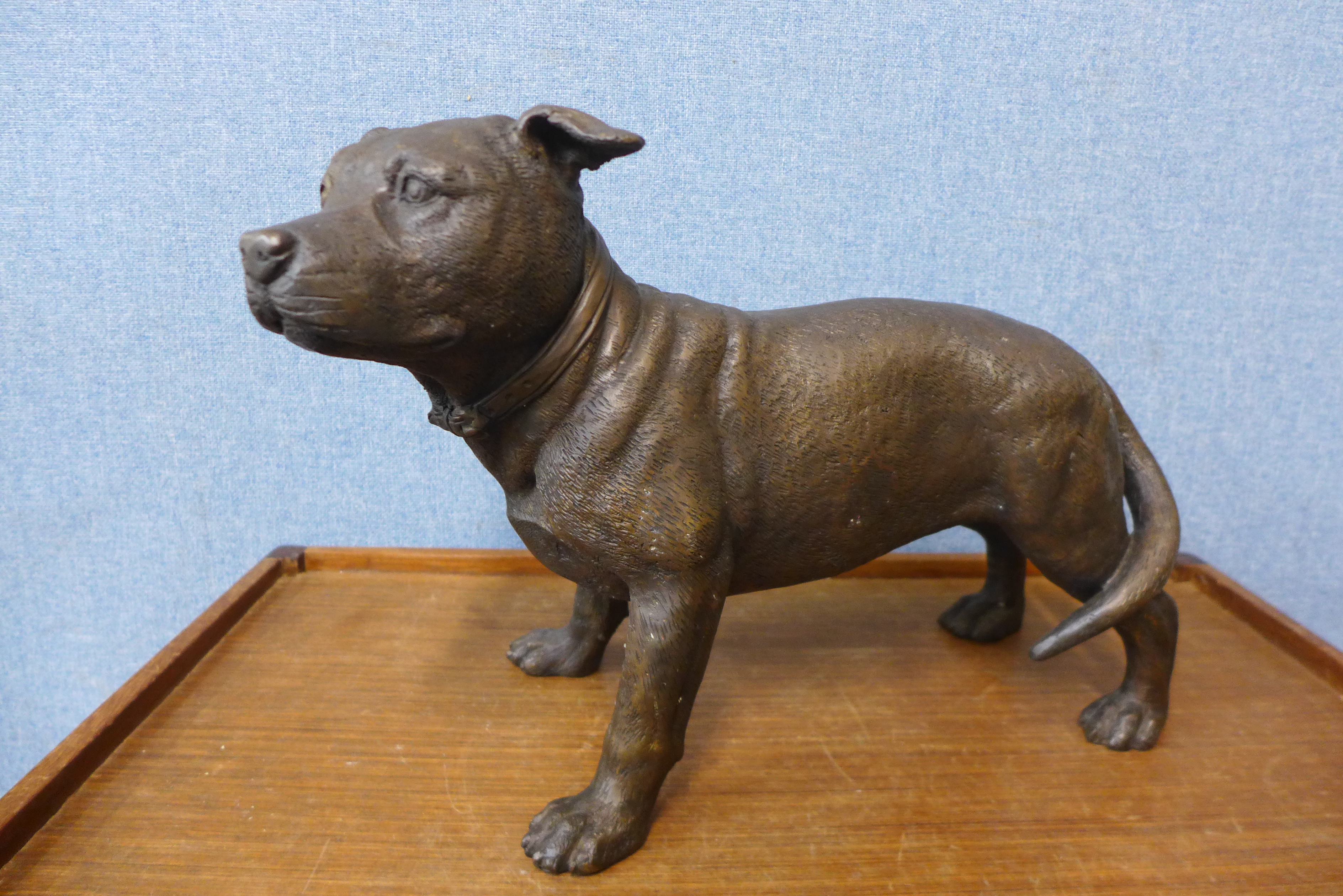 A large bronze figure of a Staffordshire bull terrier, 31cms h