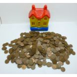 Over 300 half pence pieces including a plastic Halifax Building Society money box