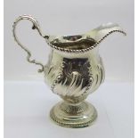 A George II silver cream jug, London 1759, 185g