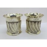 A pair of silver bottle holders by William Comyns, London 1902, 207g