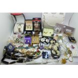 Wristwatches and costume jewellery, unused and mostly packaged