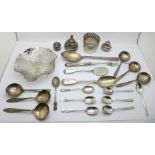 Eight silver spoons, two silver jar tops and a German 800 silver beaker holder, 202g, and a