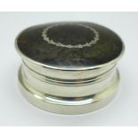 A circular silver and tortoiseshell box, Birmingham 1922, diameter 7.5cm, (rim a/f, out of shape)