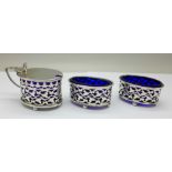 A set of three silver condiments with blue glass liners, 85g of silver, (one salt a/f, split