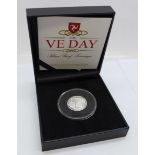 The VE Day .999 silver proof sovereign issued by the Isle of Man, with certificate of