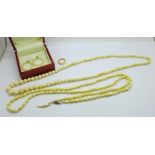 Two ivory necklaces, (one with mother of pearl pendant), a pair of earrings and a ring