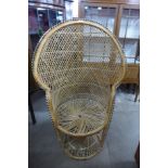 A child's wicker peacock shaped chair