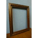 An Anglo-Indian hardwood picture frame, inlaid with brass and copper, 61 x 48cms