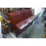 A Pearl River mahogany overstrung upright piano