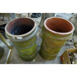 A pair of terracotta chimney pots