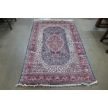 An Indian Agra cream ground satin rug, 77 x 49cms