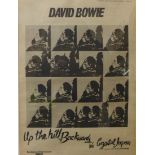 A 1980's original music poster/advert for David Bowie single - Up The Hill Backwards, 39 x 29cms,