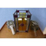 Two railway lights and a stained glass candle lantern