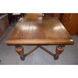 An oak draw-leaf table