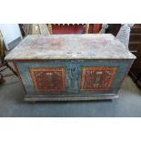 An 18th Century continental painted pine cassone, 72cms h, 124cms w, 69cms d