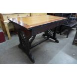 A Victorian Gothic Revival oak library table (later top), 72cms h ,116cms w, 69cms d