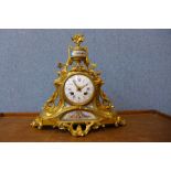 A 19th Century French ormolu and Sevres style porcelain mantel clock, the enamelled dial signed Le