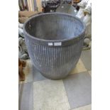 A galvanised dolly tub