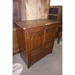 An oak stereo cabinet