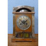 An early 20th Century Jugendstil oak and metal mounted mantel clock, 36cms h