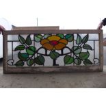 A set of three Art Nouveau stained glass windows