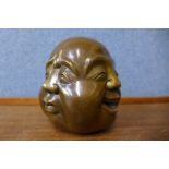 An oriental bronze four faced Buddha, 12cms h