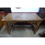 A Victorian Gothic Revival carved oak church altar table, 77cms h, 122cms w, 60cms d