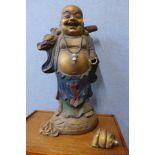 A large oriental painted cast metal Buddha, 78cms h