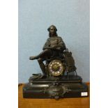 A 19th Century French Belge noir mantel clock, mounted with spelter figure of Raphael, the