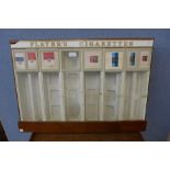 A vintage Player's cigarette dispenser machine