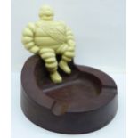 A Monsieur Bibendum Michelin Man Bakelite ashtray