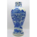 A Chinese blue and white vase with Kangxi four character mark to the base, 23cm