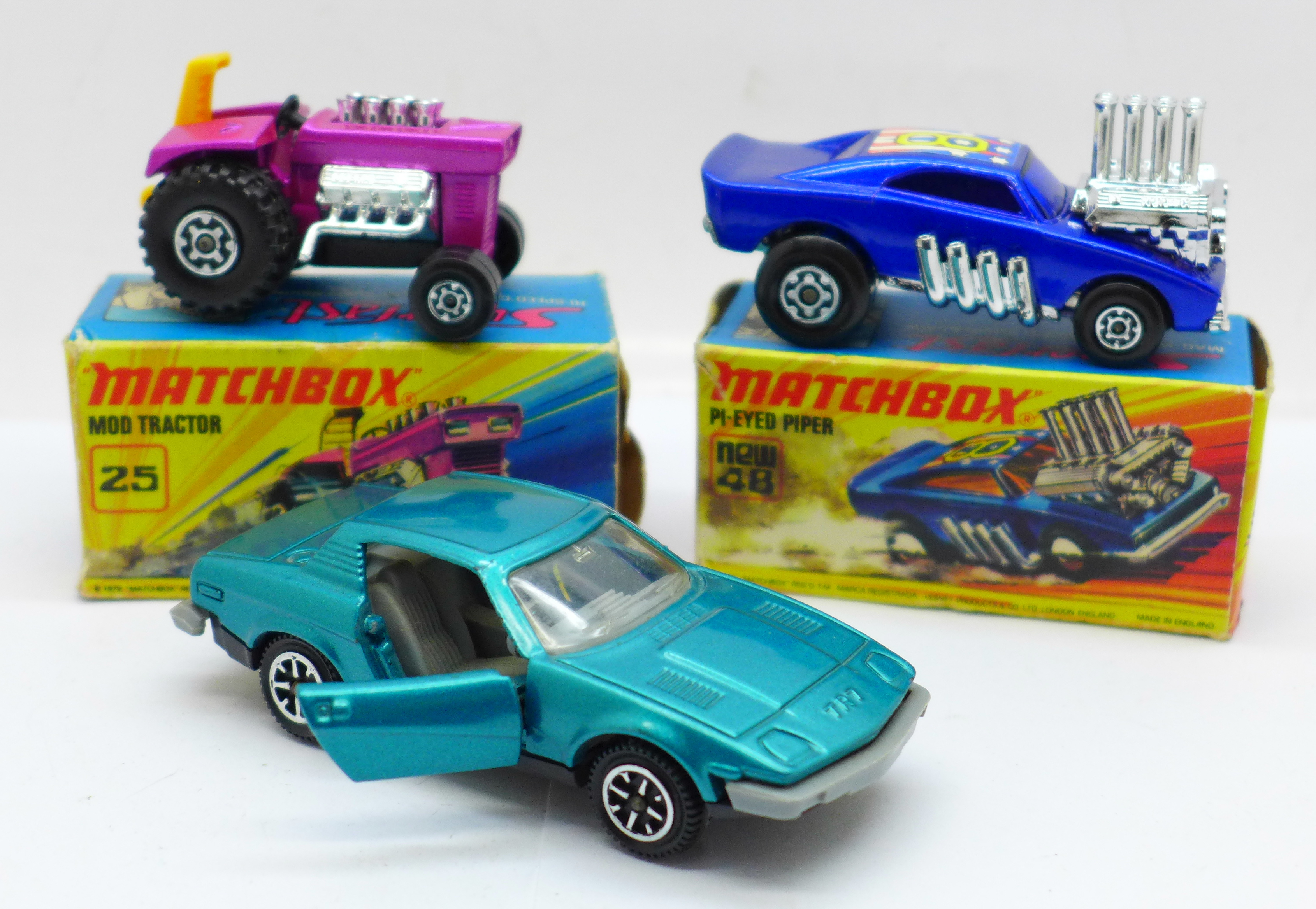 Two Matchbox Superfast vehicles, No. 48 and No. 25, boxed, and a Dinky TR7 turquoise car, (rare
