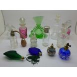 Thirteen perfume bottles and atomisers