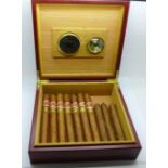 A humidor with ten cigars, seven Cuban Romeo y Julieta Churchill and three others