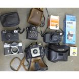 A collection of cameras including Zenit-E, Canon, Kodak, Polaroid, etc., and equipment **PLEASE NOTE